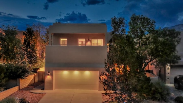 view of front of property with a garage