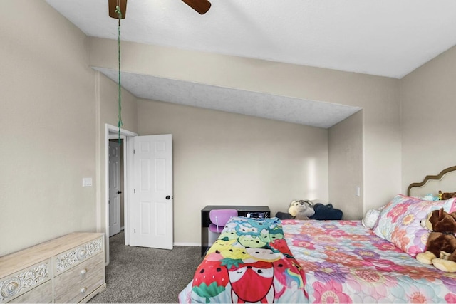 bedroom with dark colored carpet and ceiling fan