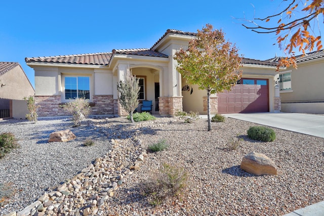 view of front of property featuring a garage