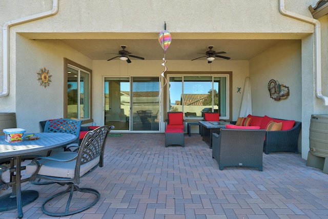 view of patio / terrace featuring an outdoor living space and ceiling fan