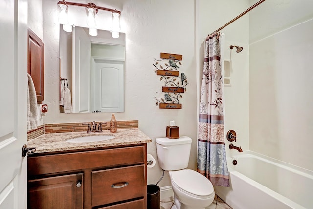 full bathroom with vanity, shower / bath combination with curtain, and toilet