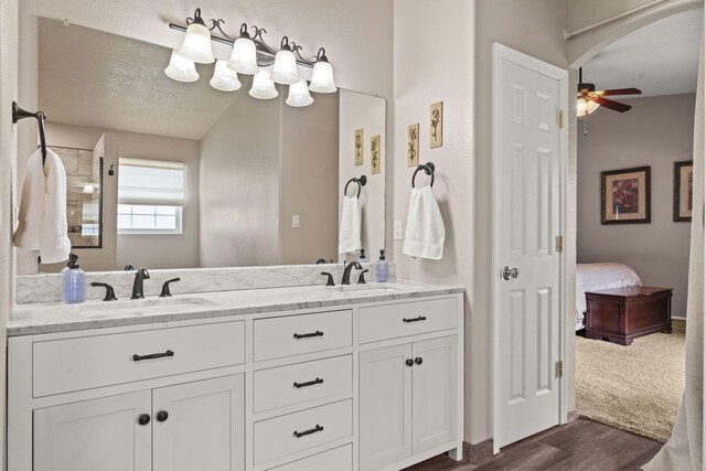 4823 Mcnary Ct NW, Albuquerque, NM 87120 - unfurnished room with wood finished floors, ceiling fan, baseboards, and a textured ceiling