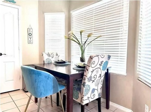 view of tiled dining space