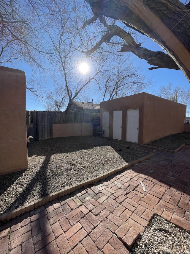 view of patio featuring an outdoor structure