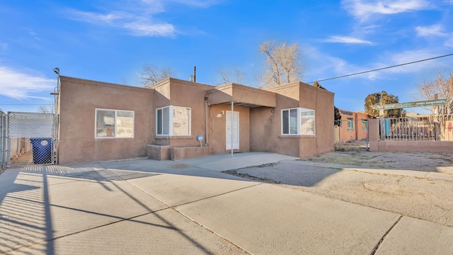 view of pueblo revival-style home