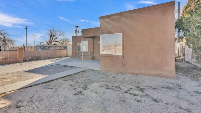 view of home's exterior featuring a patio area