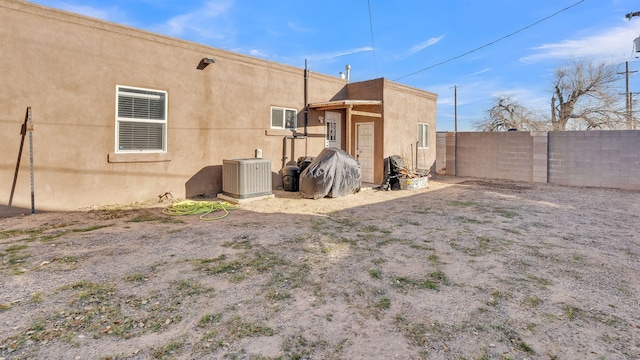 back of property with cooling unit