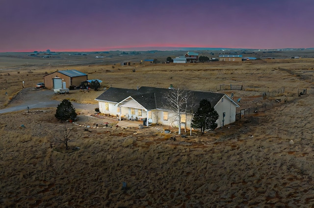 aerial view at dusk with a rural view