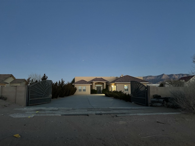 view of front of property with a mountain view