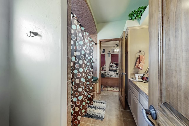 bathroom with vanity and tile patterned flooring