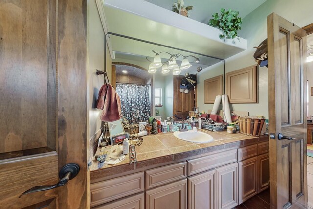 bathroom featuring vanity and a shower with curtain