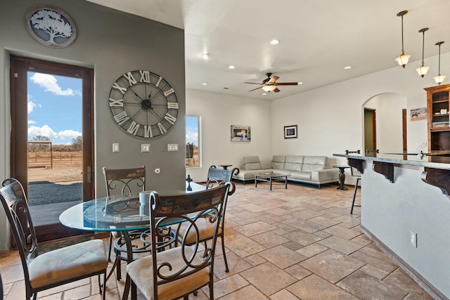 dining room featuring ceiling fan