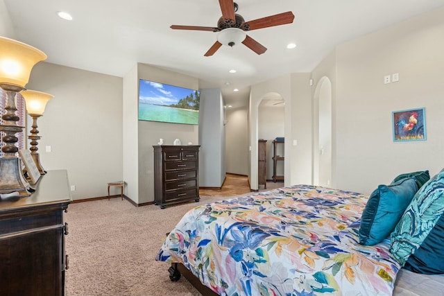 carpeted bedroom featuring ceiling fan