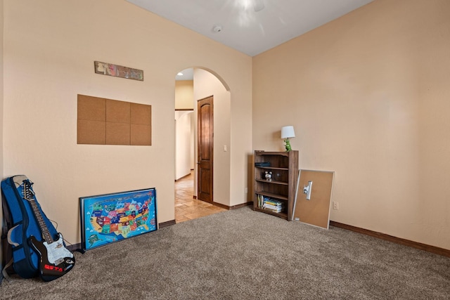 playroom featuring light carpet