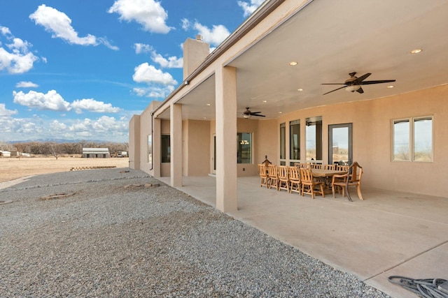 view of patio / terrace featuring ceiling fan