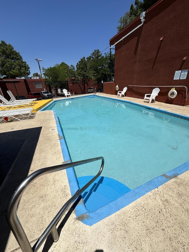 view of pool with a patio