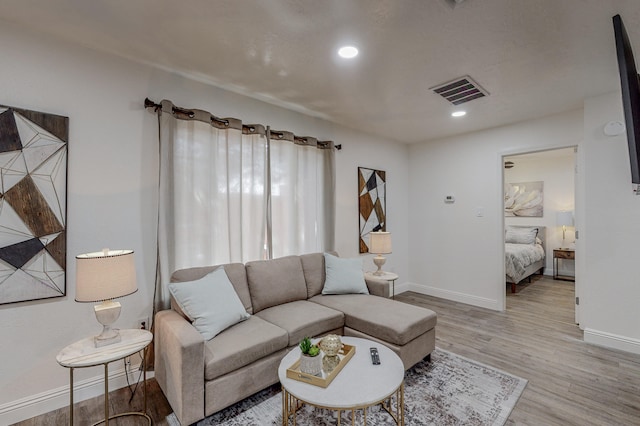 living room featuring light hardwood / wood-style floors