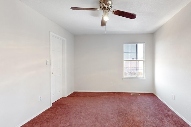 unfurnished room with carpet floors and ceiling fan