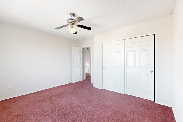 unfurnished bedroom with carpet floors, a closet, and ceiling fan