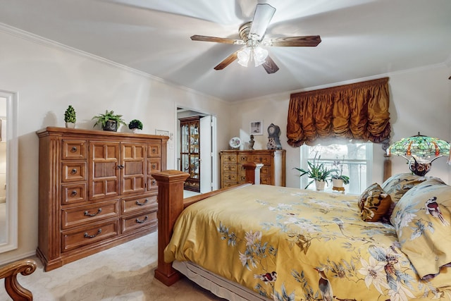 bedroom featuring crown molding and ceiling fan