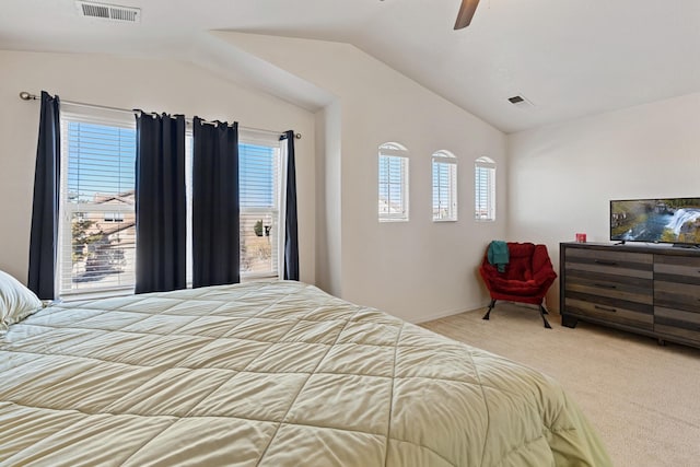 bedroom with light carpet, lofted ceiling, and ceiling fan