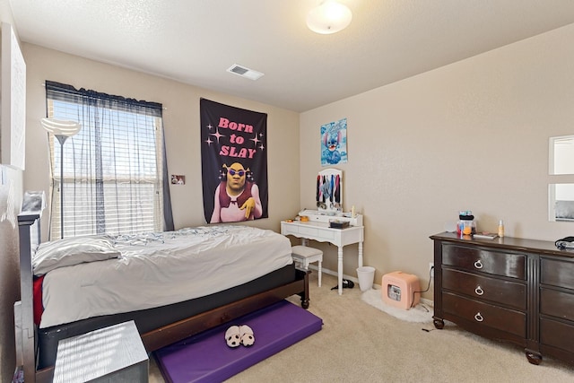 bedroom with light carpet