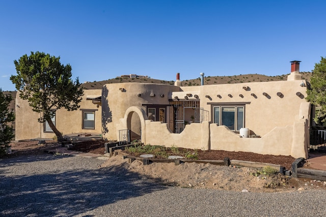 view of pueblo revival-style home