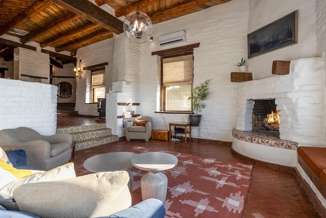 living room featuring beam ceiling, wood ceiling, a wall unit AC, and a large fireplace