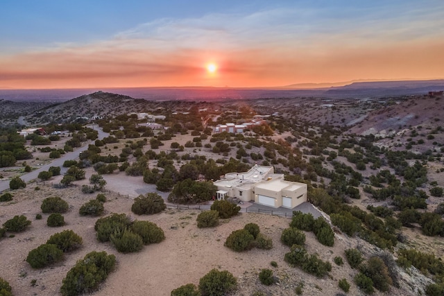 aerial view at dusk with a mountain view