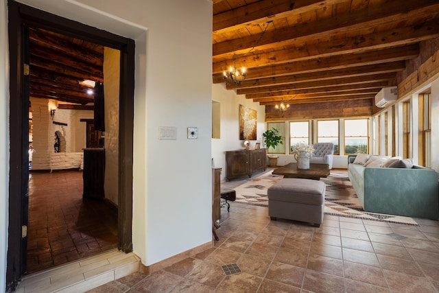 living room with a chandelier, wooden ceiling, a wall mounted AC, and beamed ceiling