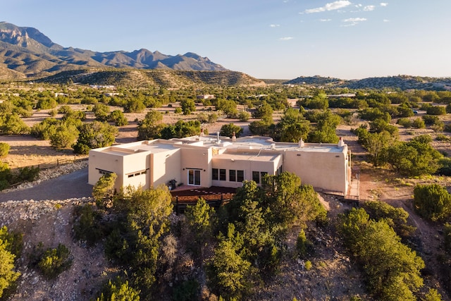 drone / aerial view featuring a mountain view