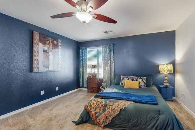 bedroom featuring ceiling fan and carpet flooring