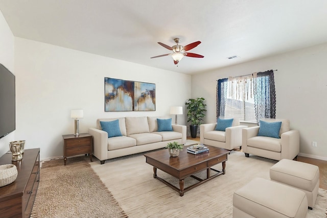 living room with ceiling fan