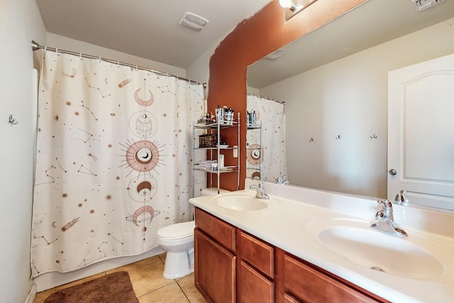 bathroom with a shower with curtain, vanity, toilet, and tile patterned flooring