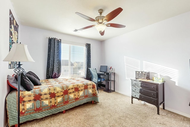 carpeted bedroom featuring ceiling fan