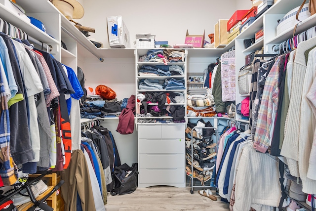 walk in closet featuring light wood-type flooring