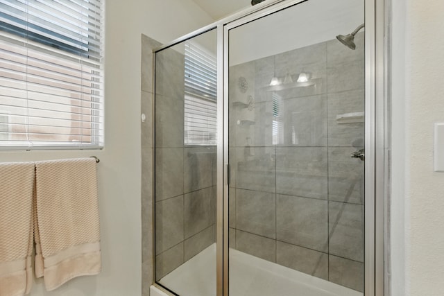 full bathroom featuring a stall shower