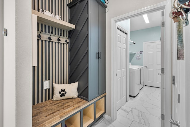 mudroom featuring washing machine and dryer