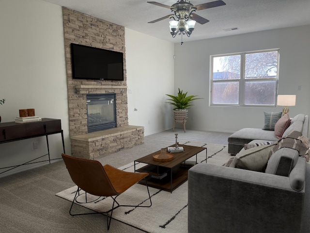 living area featuring a fireplace, visible vents, light carpet, ceiling fan, and baseboards