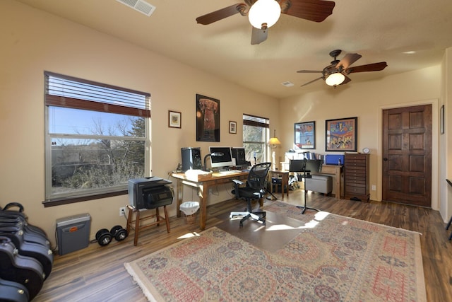 office area featuring dark hardwood / wood-style flooring and ceiling fan