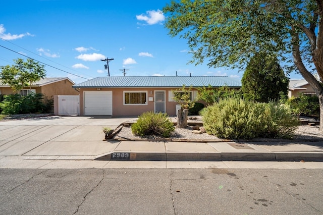 single story home featuring a garage