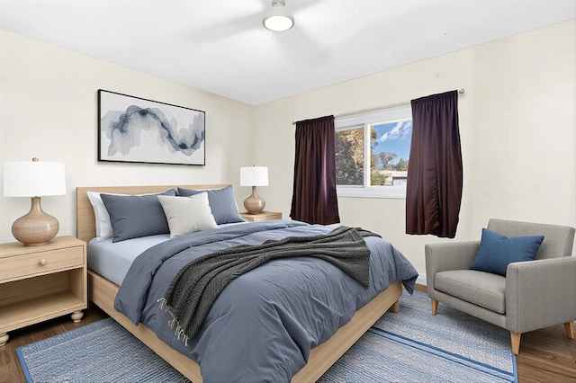 bedroom with wood-type flooring