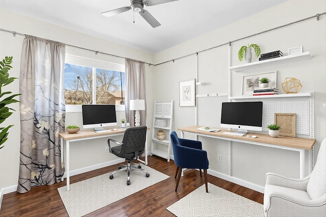 office with dark hardwood / wood-style flooring and ceiling fan