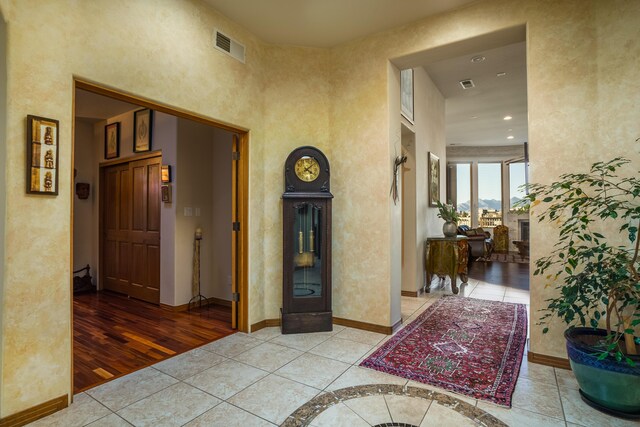 dining space featuring dark wood-type flooring, ceiling fan, and a skylight