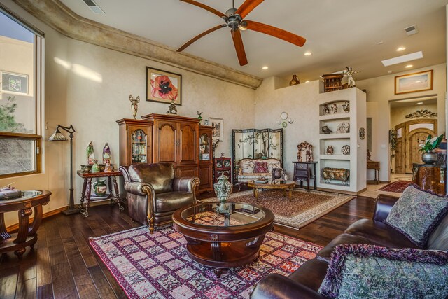 kitchen with a breakfast bar, decorative light fixtures, backsplash, kitchen peninsula, and a mountain view