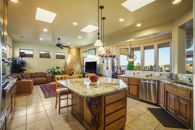 full bathroom with vanity, tile patterned floors, toilet, and shower / tub combo with curtain