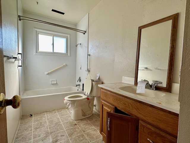 full bathroom with shower / tub combination, vanity, and toilet