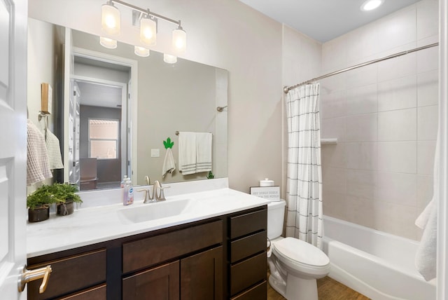 full bathroom featuring vanity, toilet, and shower / bath combo with shower curtain