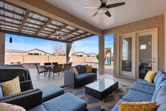 view of patio with ceiling fan, a grill, an outdoor hangout area, and a pergola