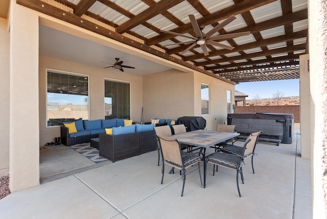 view of patio featuring area for grilling, an outdoor hangout area, a hot tub, and ceiling fan